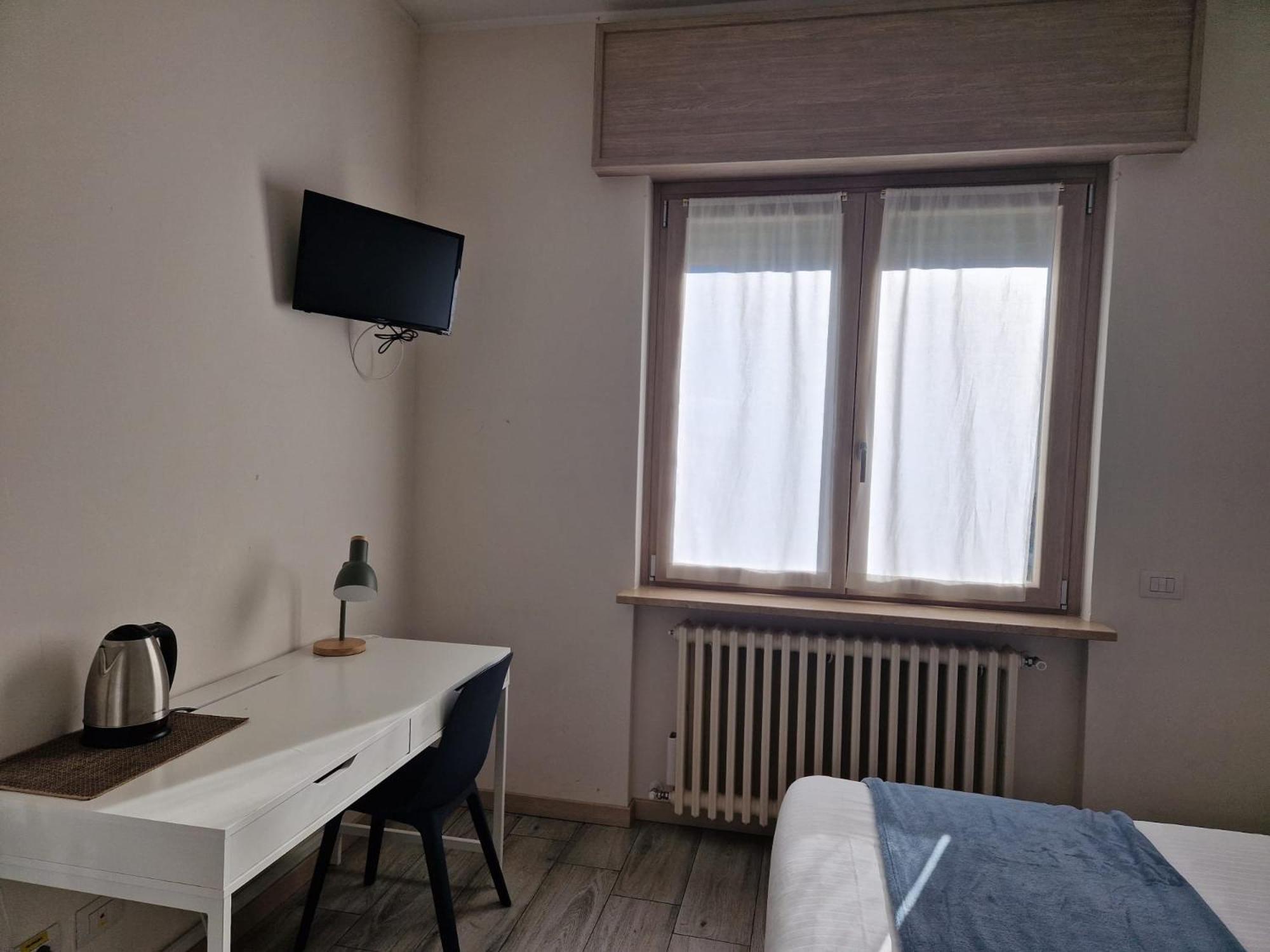 Отель Bgy Airport House Грассоббьо Номер фото